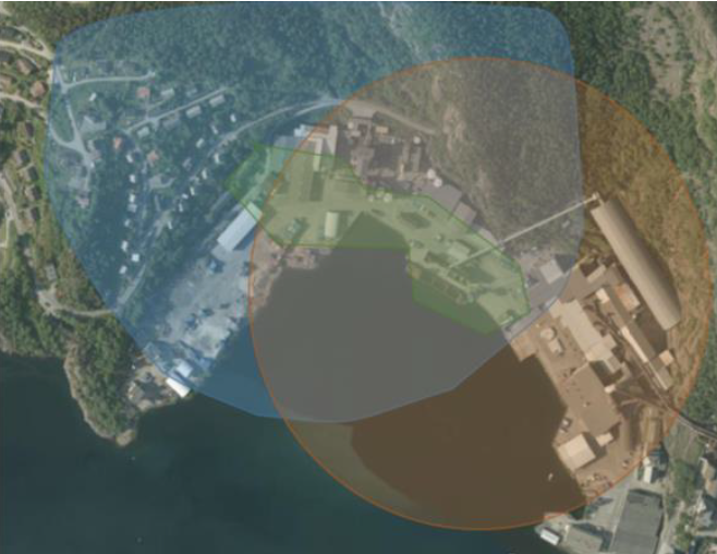 Illustrasjonsfoto, flyfoto av eit industriområde der sikringssoner rundt er teikna på.